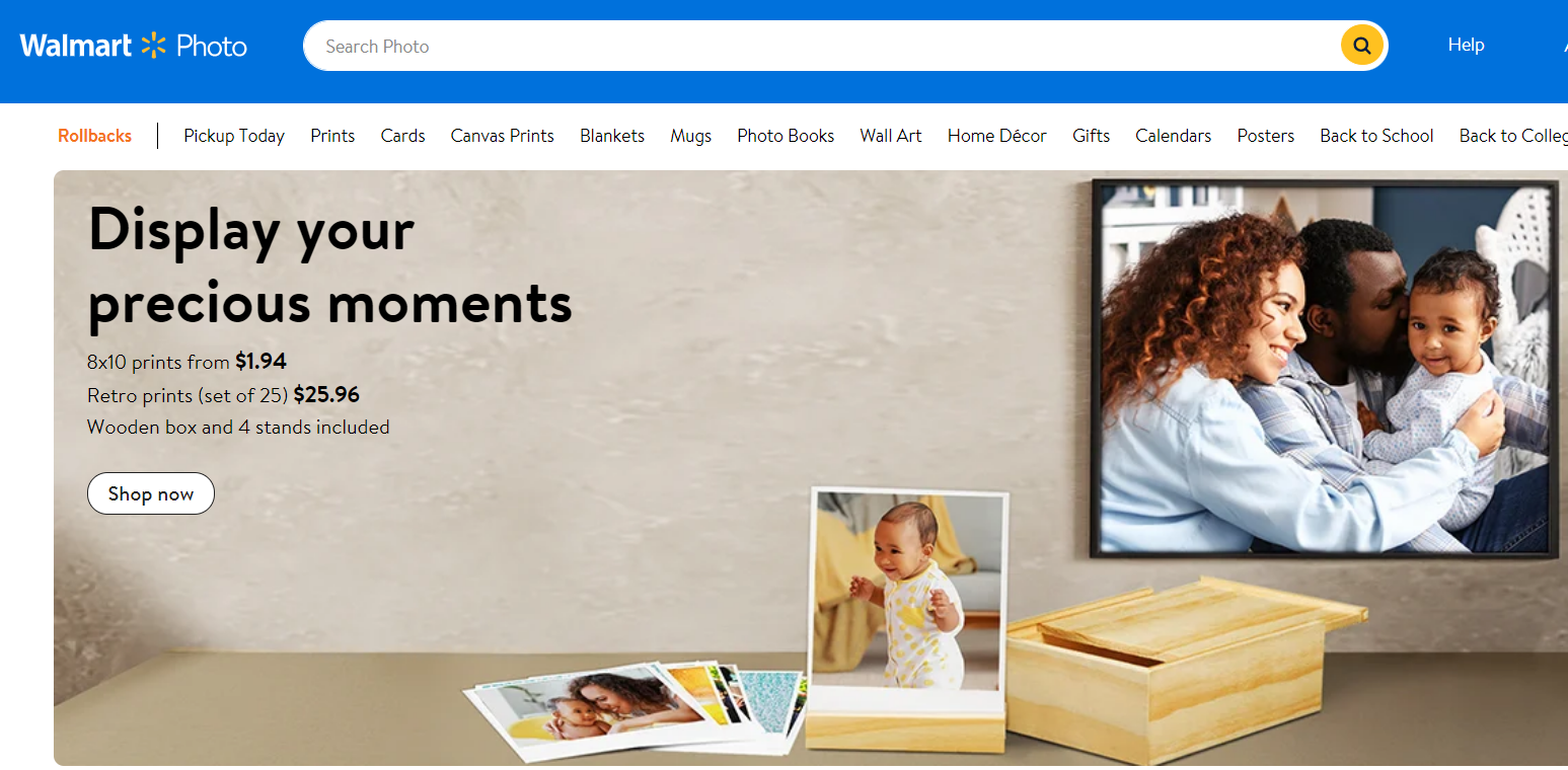 Wal-mart's homepage featuring a woman and child, showcasing their photo printing service.