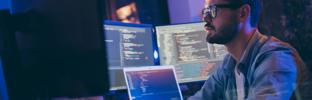 A man is configuring infrastructure at night.