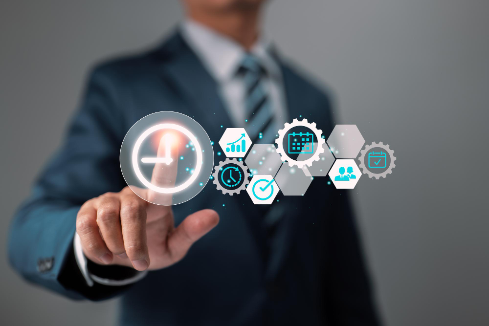 A businessman is pointing at a clock with gears on it.