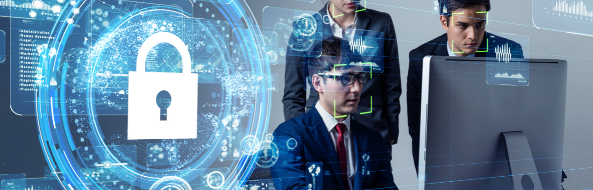 A group of people looking at a computer screen with a padlock on it.