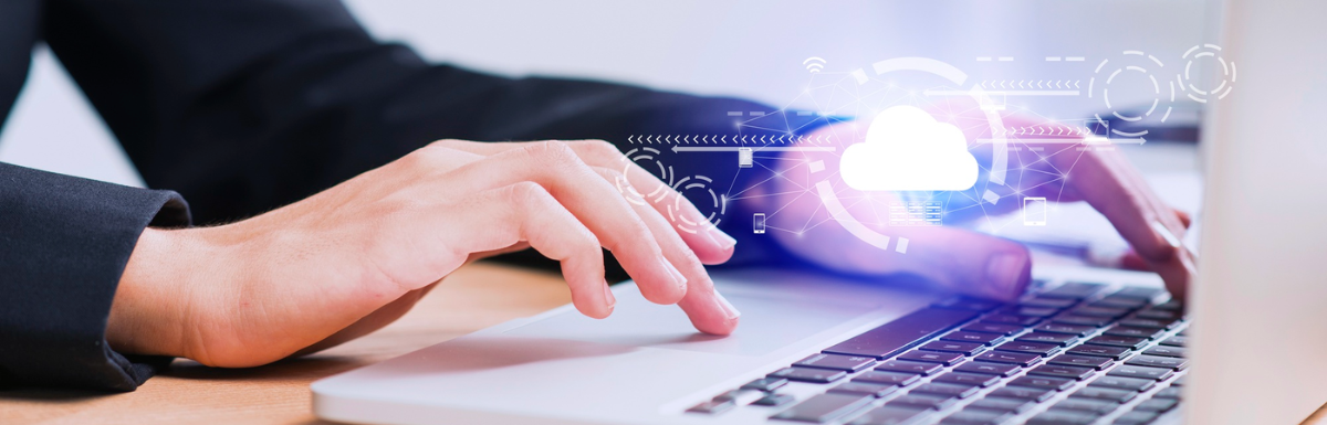 A person is typing on a laptop connected to Google Firebase.