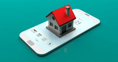 Small house on a smartphone. 3d illustration