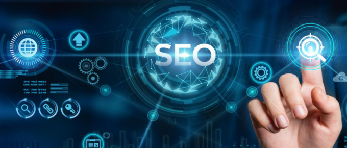 A hand is pointing at a seo icon on a blue background.