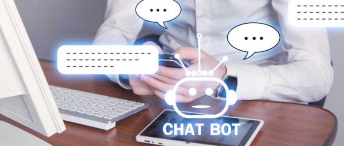 A man interacts with an HR chatbot on his computer.