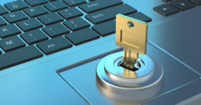 Cyber security. Key in a padlock, laptop background. 3d illustration
