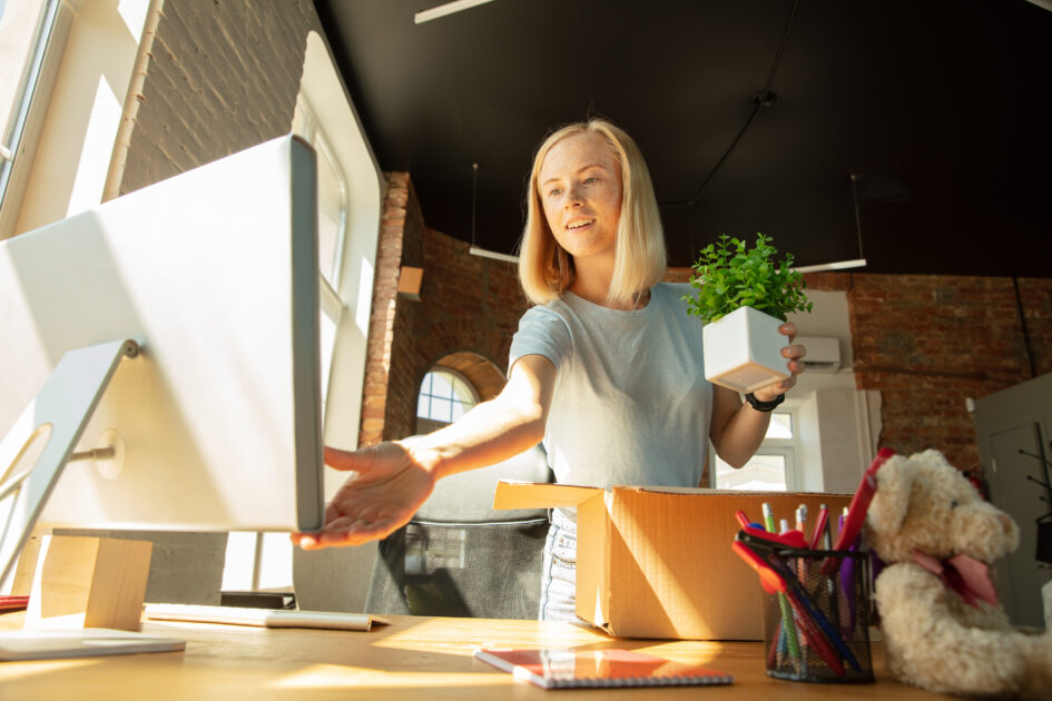 A young businesswoman moving in office, getting new work place